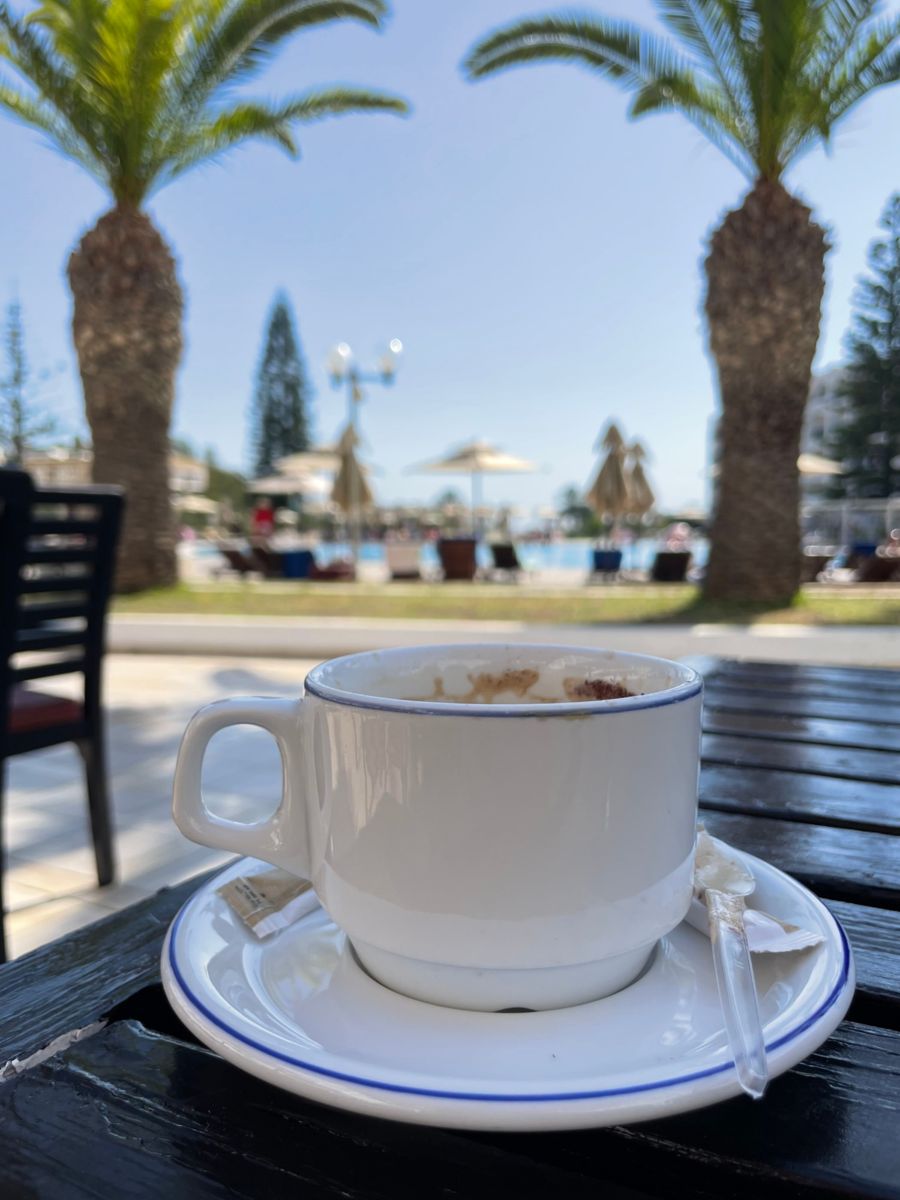 Coffee by the pool on a working day